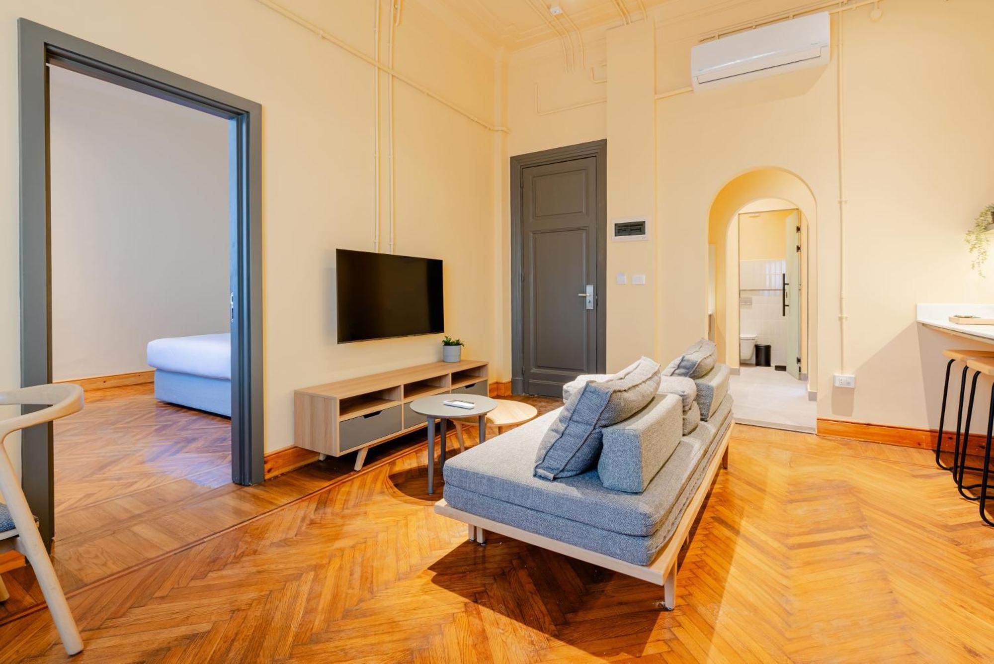 Grey L Downtown Menasce House Alexandria